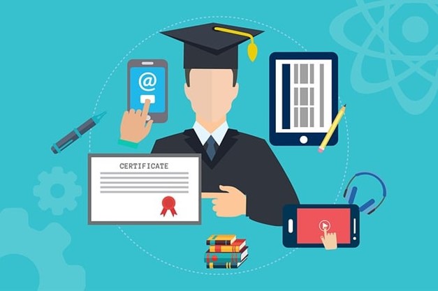 A person in a graduation gown pointing at a certificateDescription automatically generated