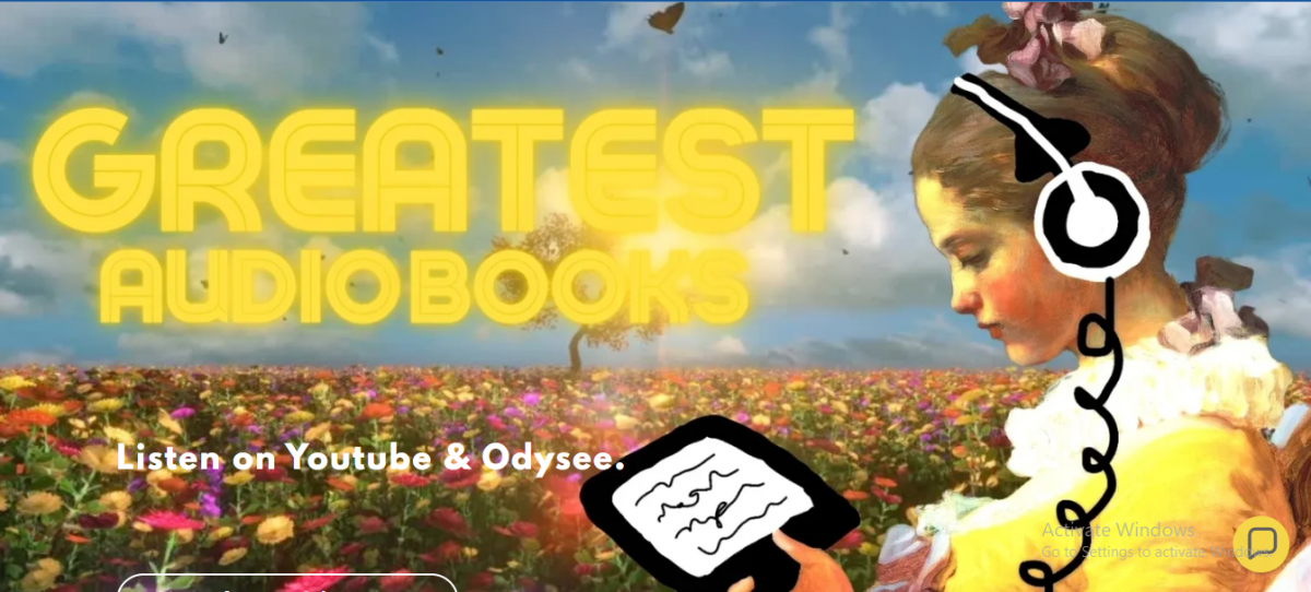 A person holding a tablet in a field of flowersDescription automatically generated