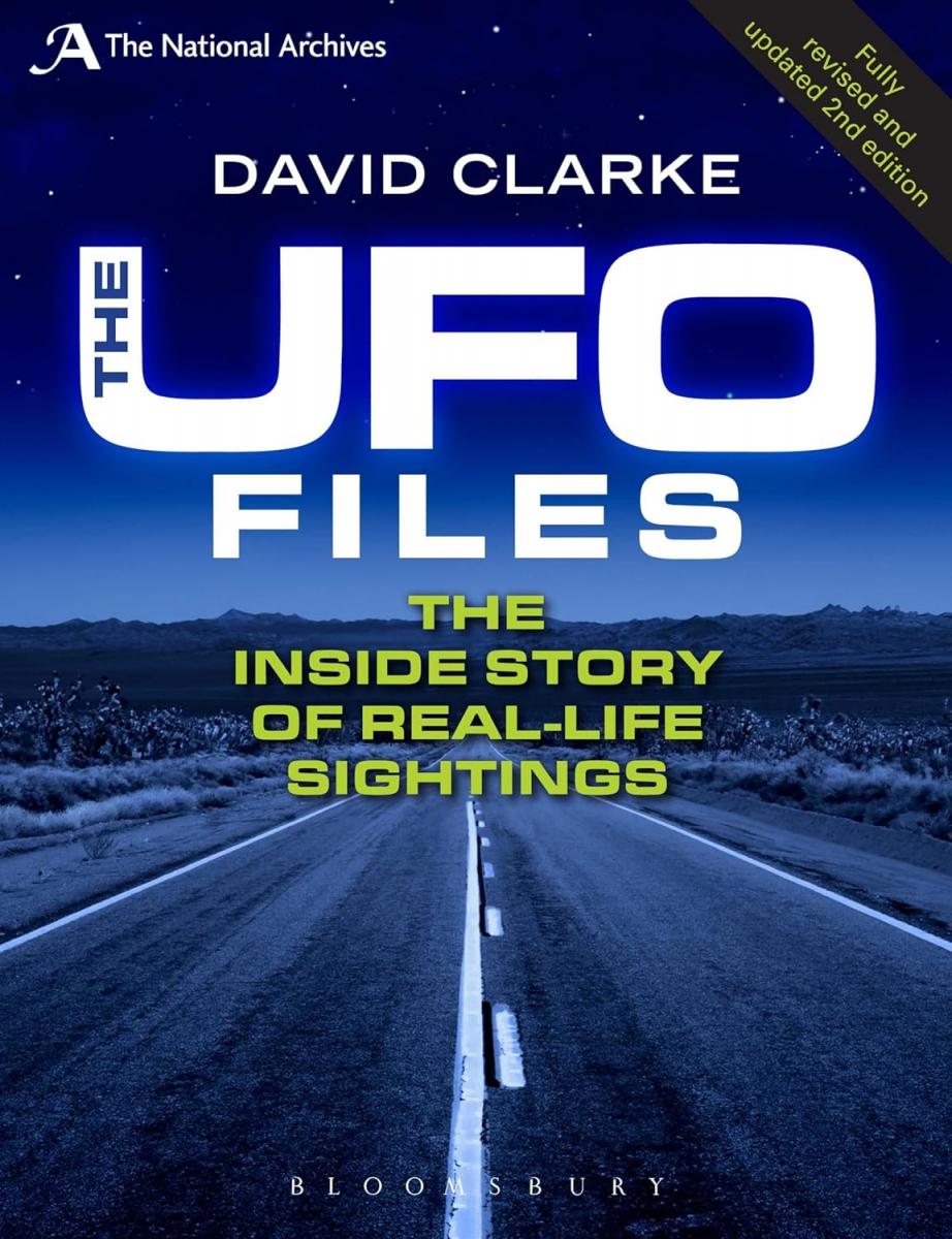 A book cover of a roadDescription automatically generated