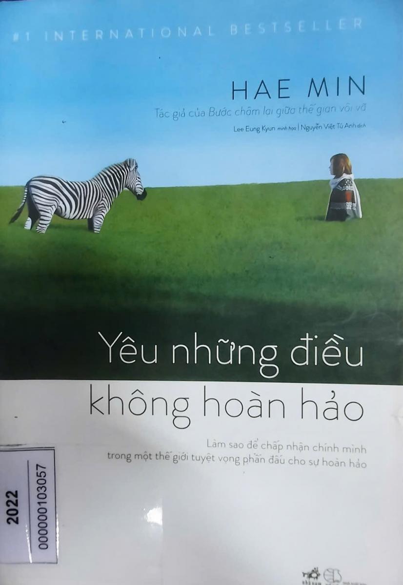 A book cover with a zebra and a childDescription automatically generated