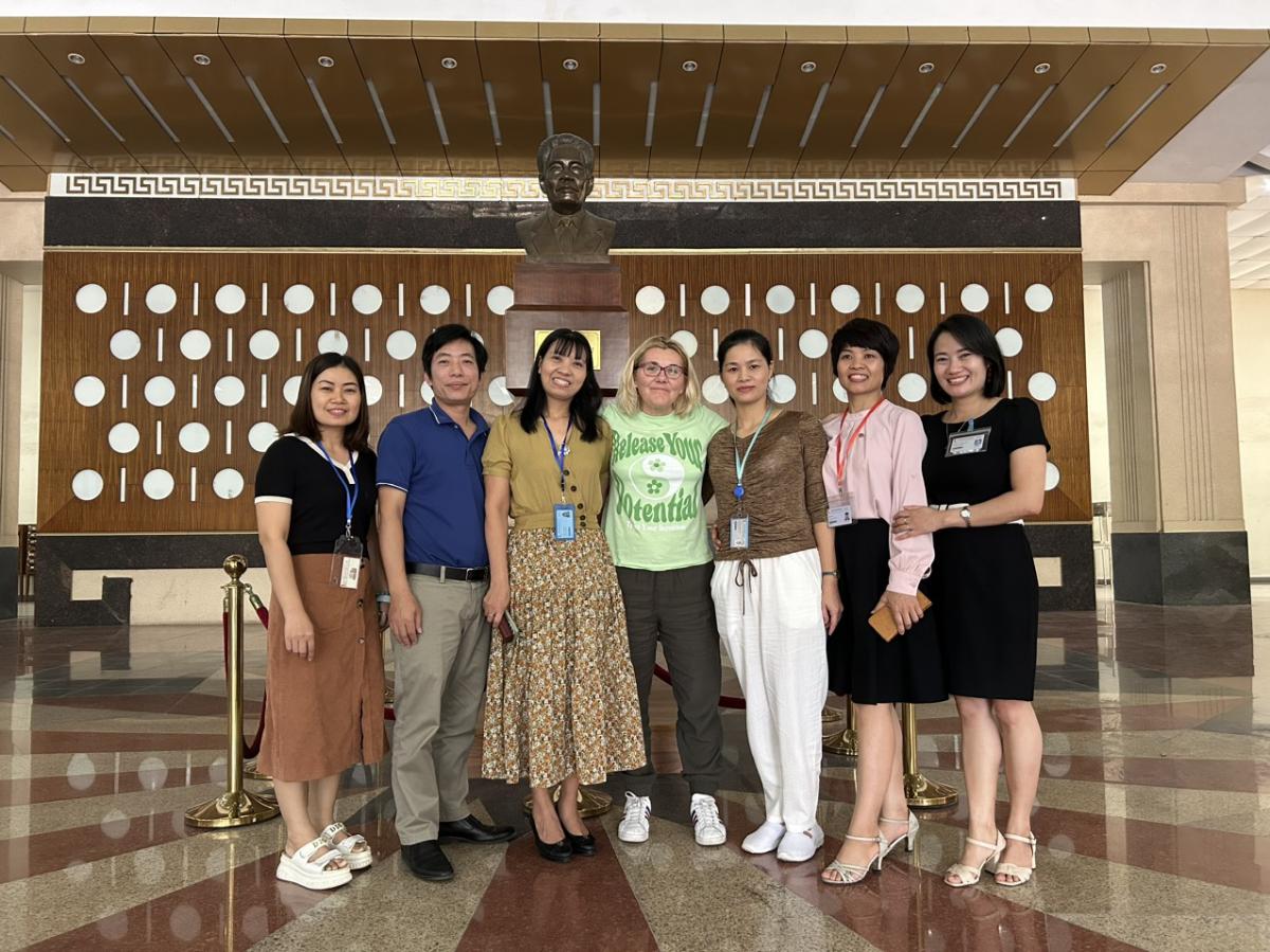 A group of people posing for a photoDescription automatically generated